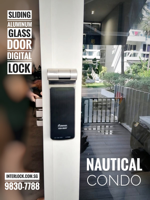 Aluminium glass sliding door digital lock in Nautical condo in Singapore.jpeg