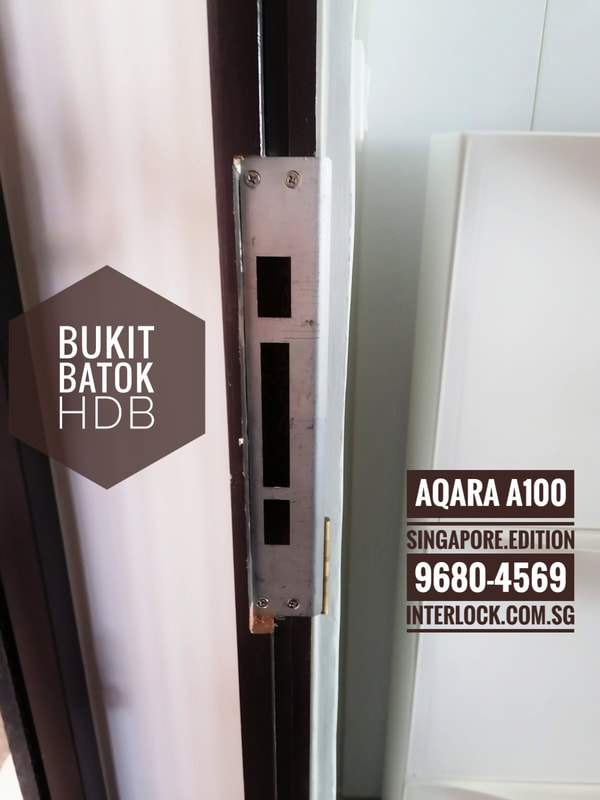 Aqara A100 Zigbee International Singapore Edition Smart Lock on a Bukit Batok HDB door. Strike plate.