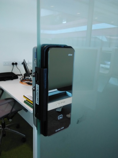 Assa Abloy Shine digital lock for glass swing door at SUTD office