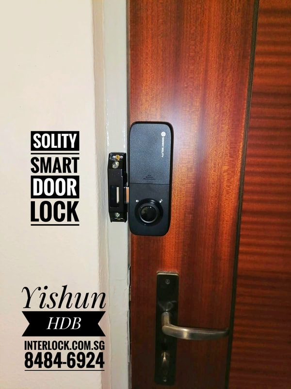 Door Lock rear view at Yishun HDB door in Singapore - Interlock